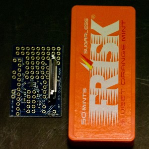 Left: MewPro w/ SMD parts and Herobus connector (soldered); Right: Frisk case sold in Japan